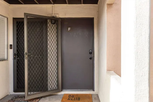 a view of backyard with small cabin