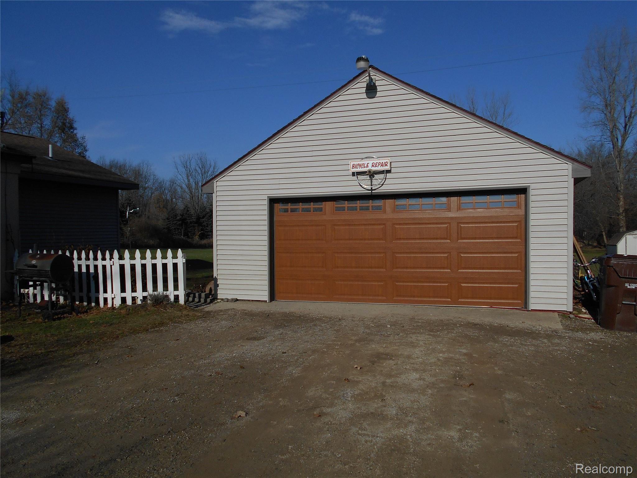 14440 West Howe Road Portland, MI 48875 - Photo 18 of 29 Two car garage