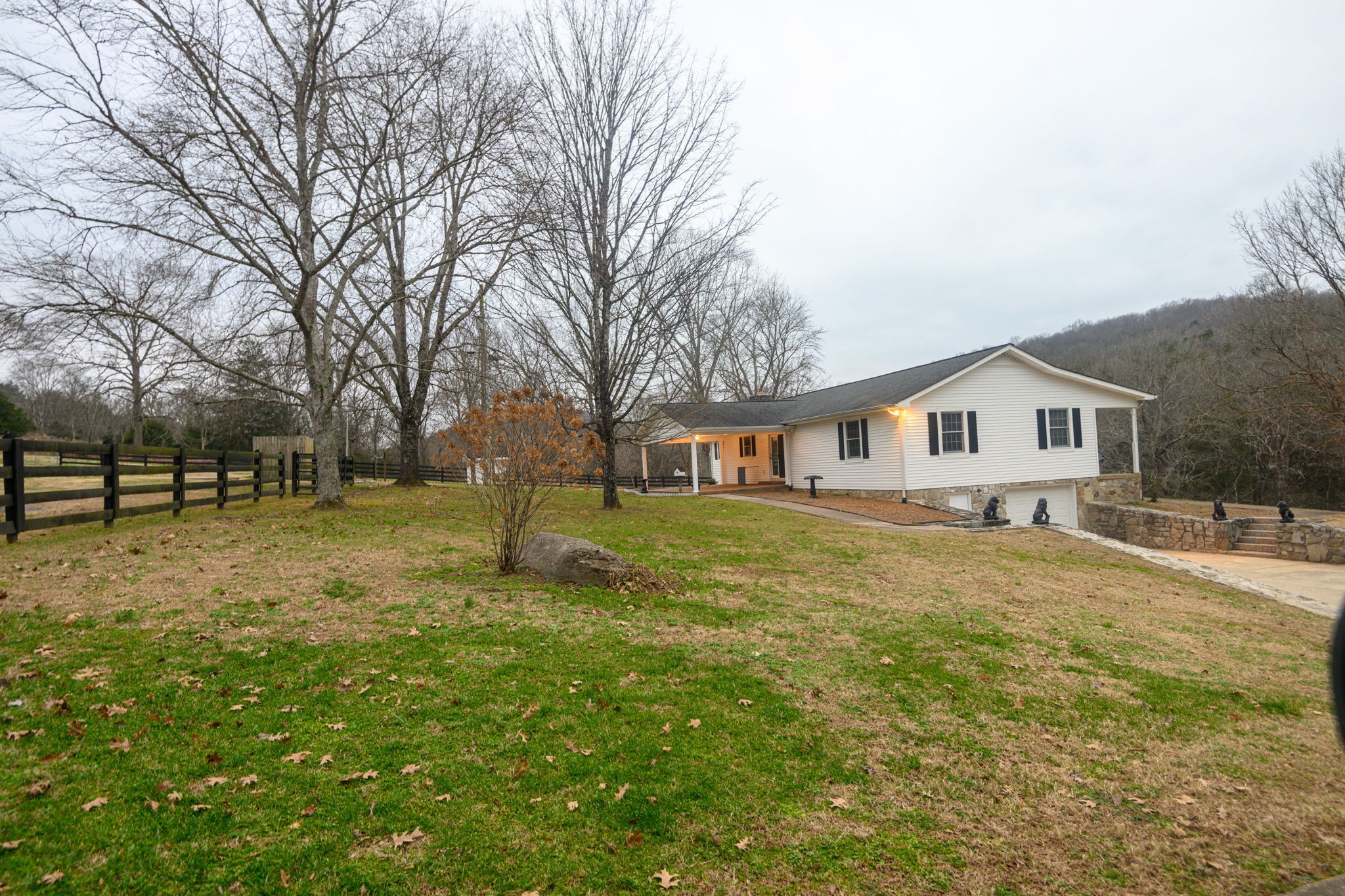 6680 Walker Creek Road Alexandria, TN 37012 - Photo 29 of 76 a front view of a house with a yard