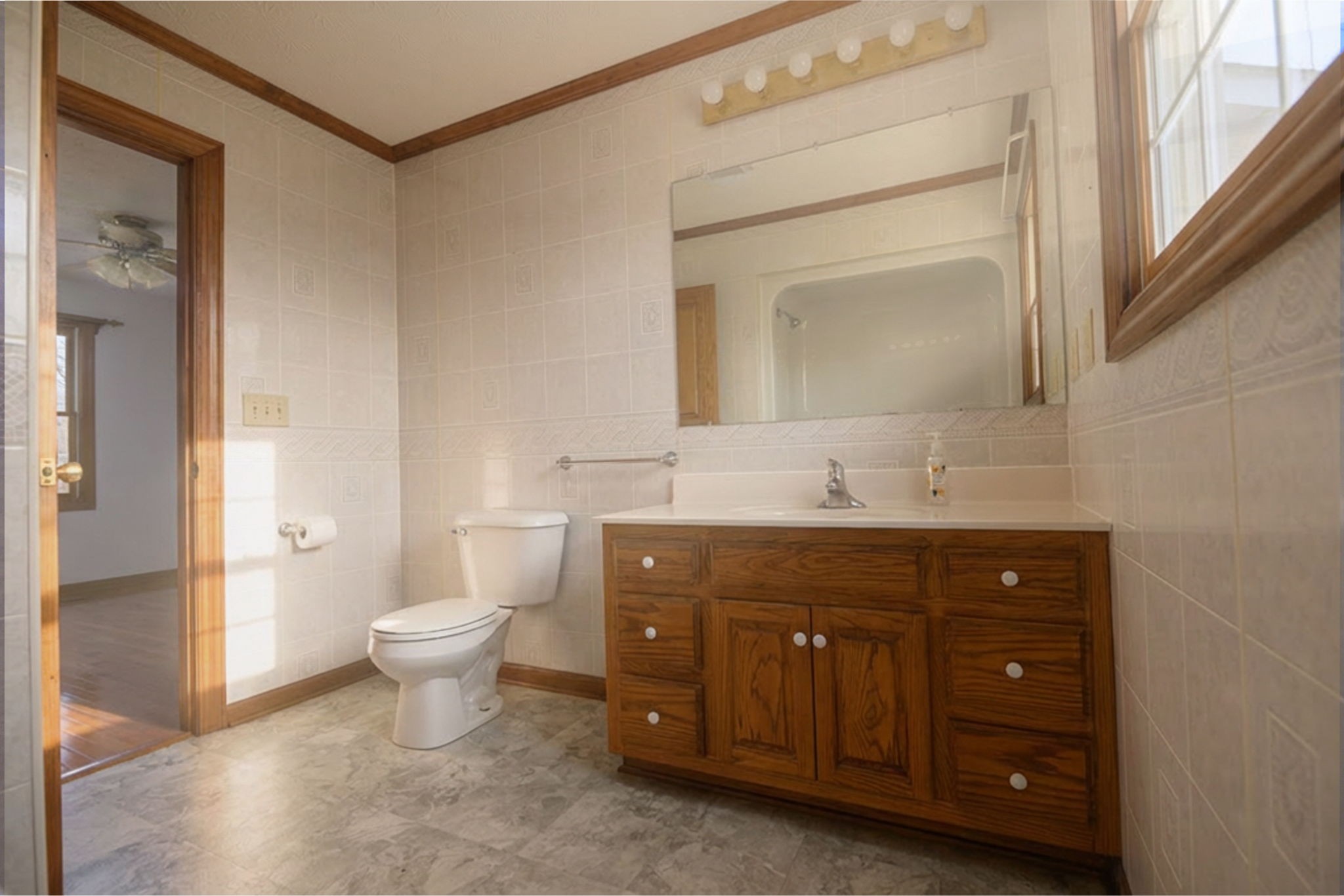 6680 Walker Creek Road Alexandria, TN 37012 - Photo 39 of 76 a bathroom with a sink vanity and a mirror