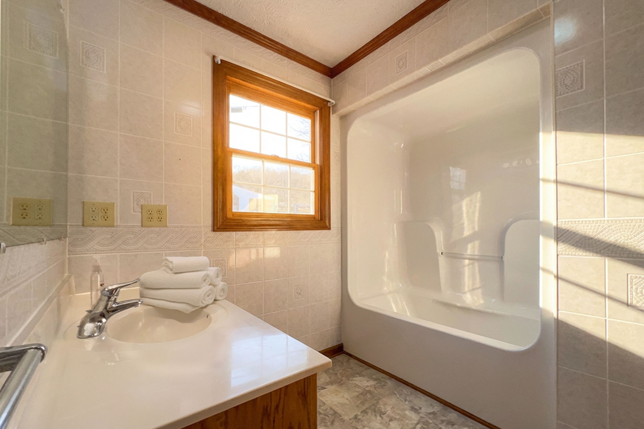 6680 Walker Creek Road Alexandria, TN 37012 - Photo 40 of 76 a bathroom with a sink tub vanity and a mirror