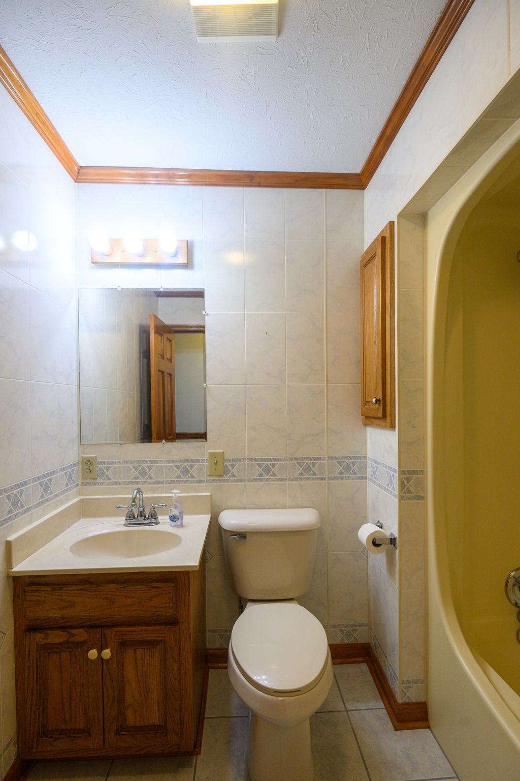 6680 Walker Creek Road Alexandria, TN 37012 - Photo 41 of 75 a bathroom with a sink toilet and shower
