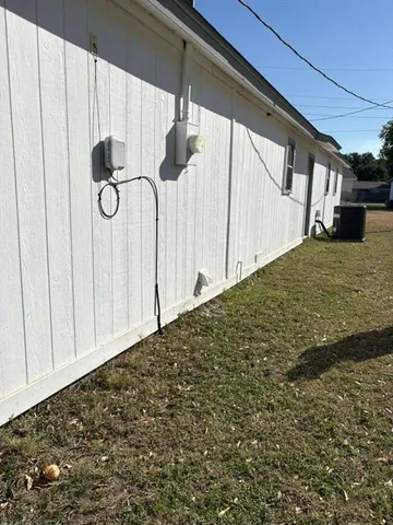 a view of a backyard of the house