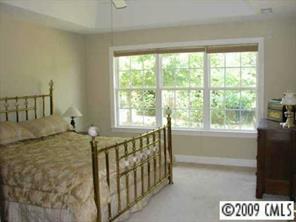 500 Crabtree Court Fort Mill, SC 29708 - Photo 6 of 8 a bed sitting in a bedroom next to a window