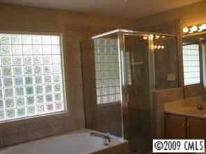 500 Crabtree Court Fort Mill, SC 29708 - Photo 7 of 8 a bathroom with a shower and a window