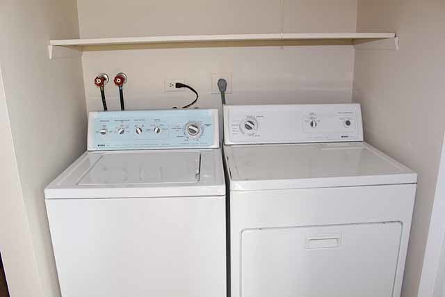779 Pahl Road, Unit 779 Elk Grove Village, IL 60007 - Photo 12 of 17 a utility room with dryer and washer