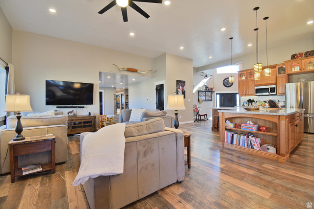 656 South Bullion Canyon Road Marysvale, UT 84750 - Photo 16 of 57 Living room featuring a ceiling fan, dark wood-type flooring, and recessed lighting