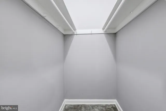 a view of small space with racks on the wall