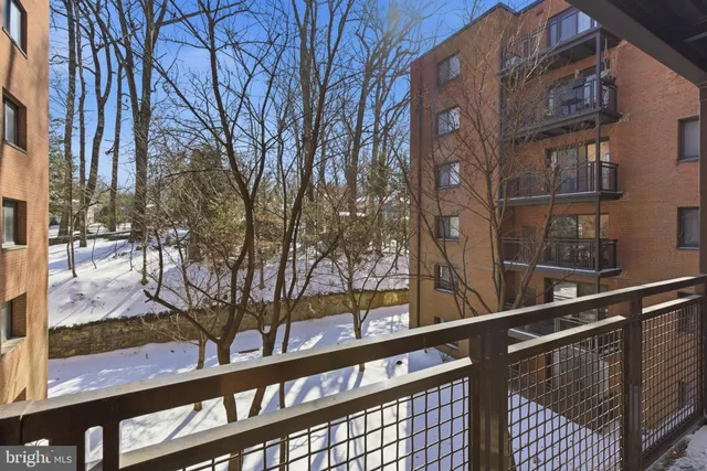 a view of a brick building from a balcony
