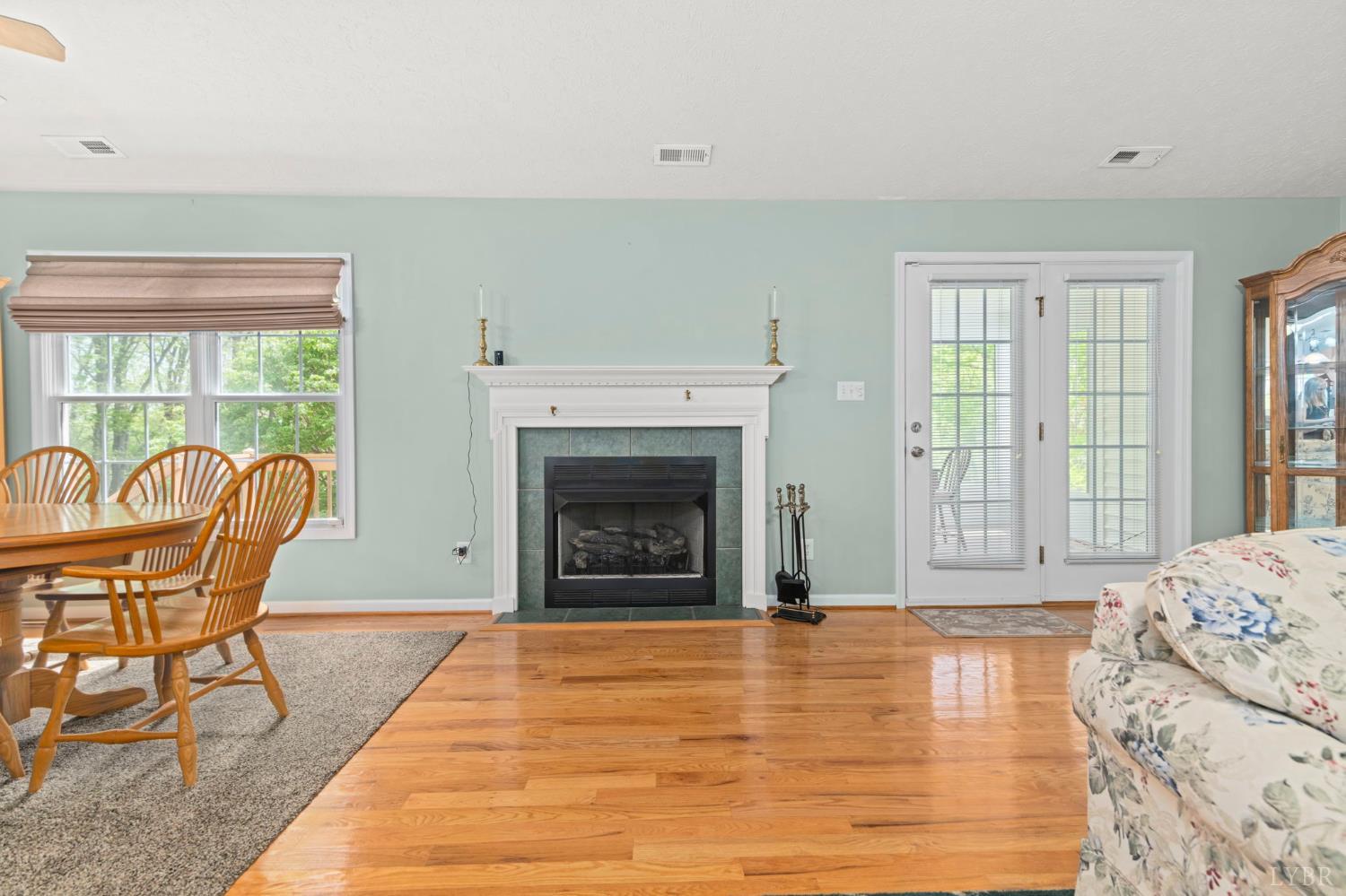 298 Braxton Ridge Road Amherst, VA 24521 - Photo 18 of 65 a living room with furniture and a fireplace