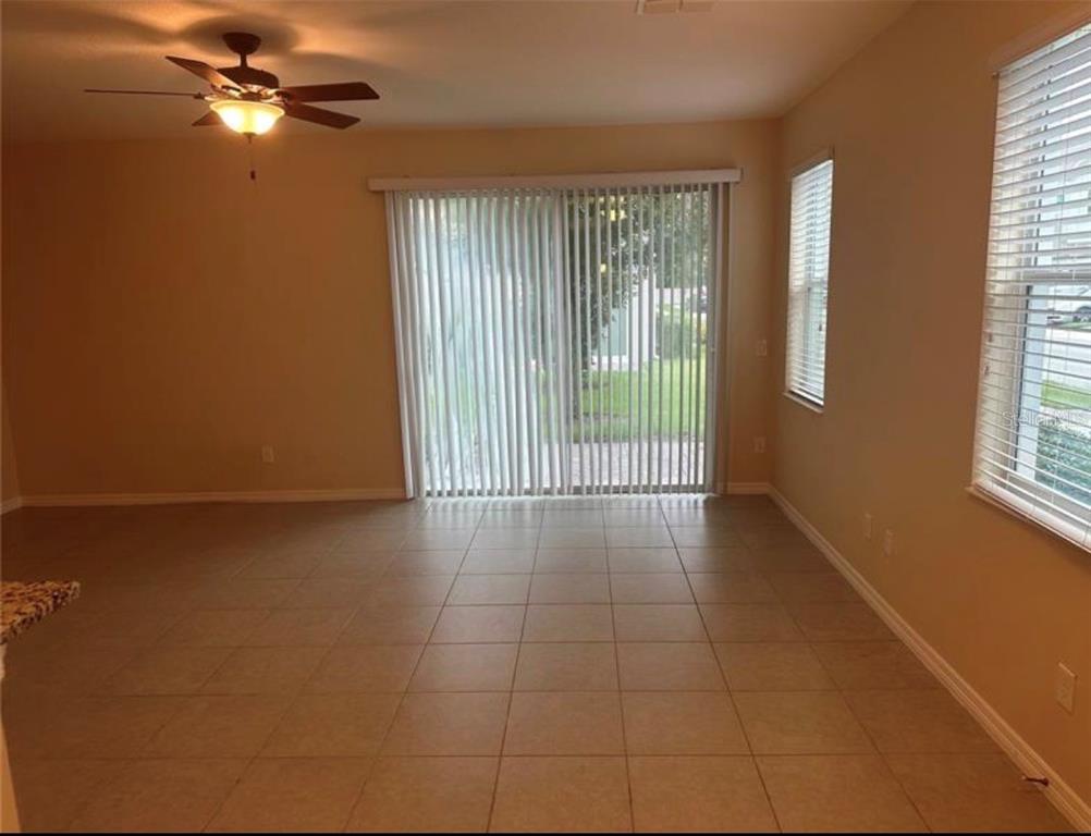 4851 Cliveden Loop Sanford, FL 32773 - Photo 2 of 24 a view of an empty room with a window
