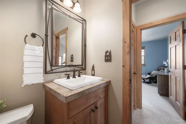 a bedroom with bed and window