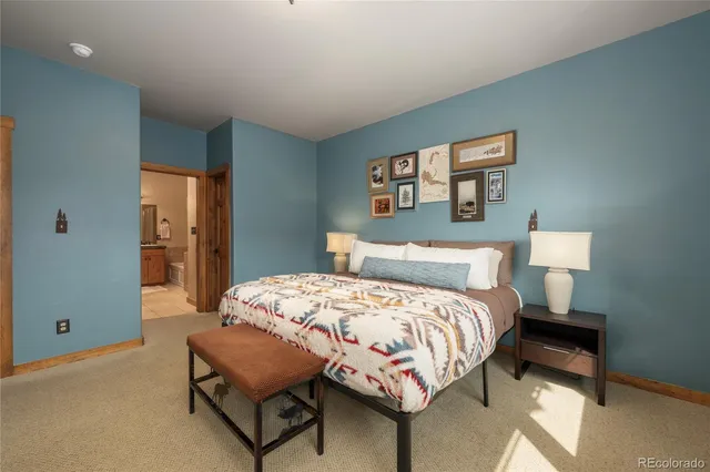 a bathroom with a tub and shower