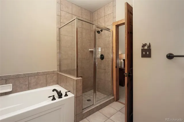 a view of a room with lots of stuff and hardwood floor