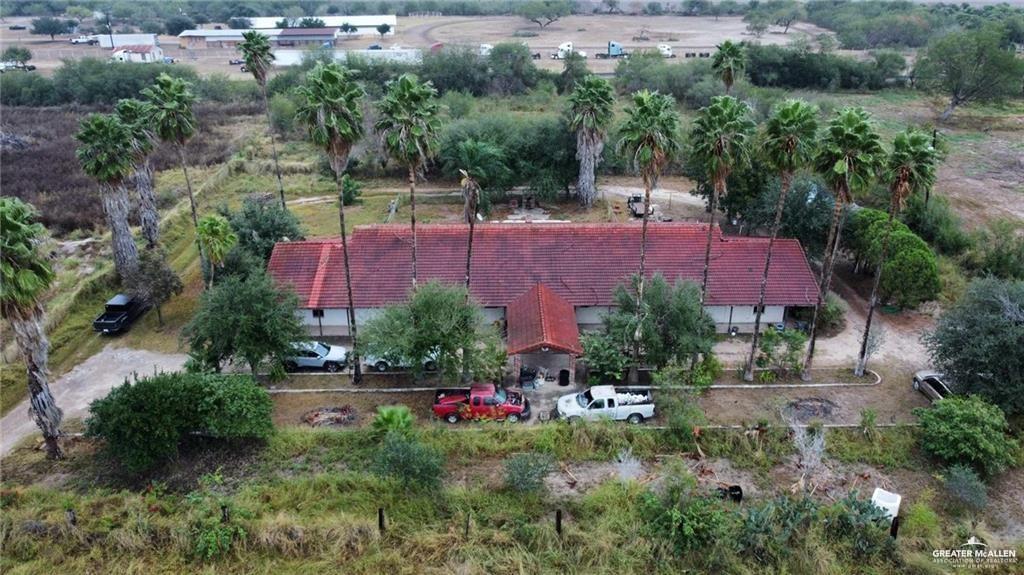5906 North Brushline Road Mission, TX 78574 - Photo 2 of 29 an aerial view of a house and yard