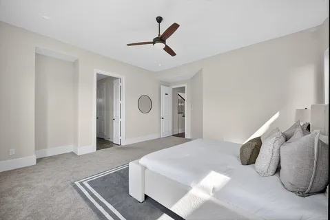 a bedroom with a bed and closet