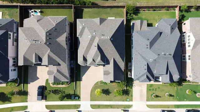 an aerial view of multiple house