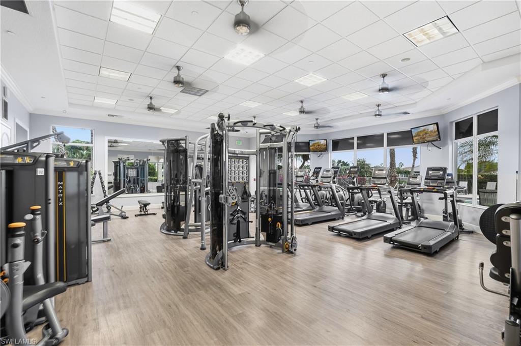 1770 Ribbon Fan Lane Naples, FL 34119 - Photo 33 of 37 a view of a room with gym equipment