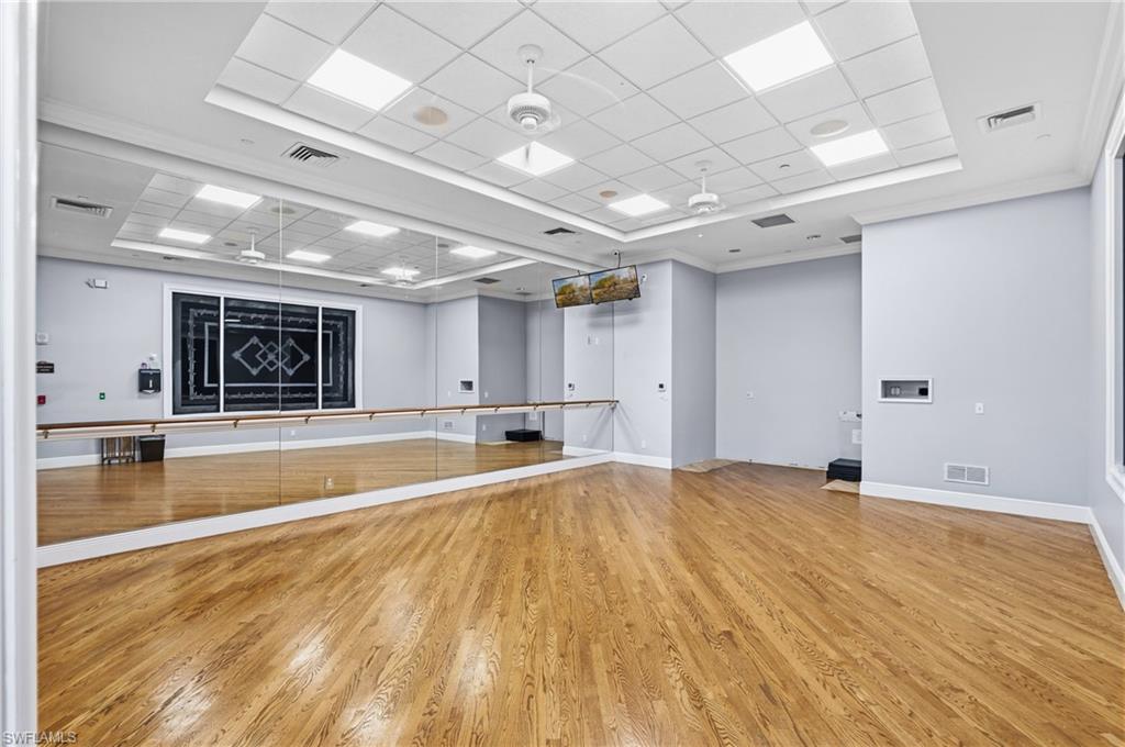 1770 Ribbon Fan Lane Naples, FL 34119 - Photo 34 of 37 a view of an empty room with kitchen view and a window
