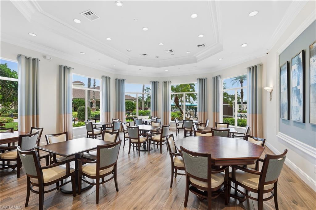 1770 Ribbon Fan Lane Naples, FL 34119 - Photo 35 of 37 a view of a dining room with furniture and window