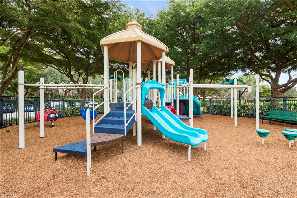 1770 Ribbon Fan Lane Naples, FL 34119 - Photo 4 of 37 a small hurt is sitting in the middle of a park