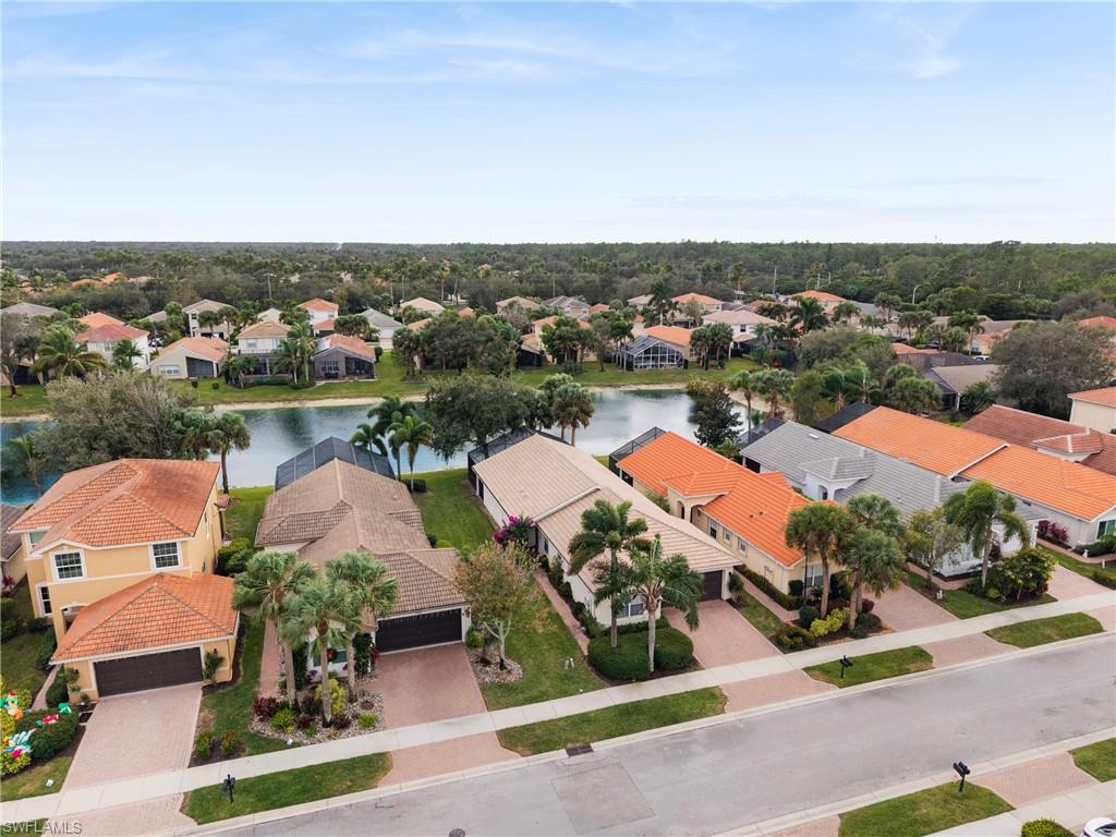 1770 Ribbon Fan Lane Naples, FL 34119 - Photo 6 of 37 an aerial view of multiple house