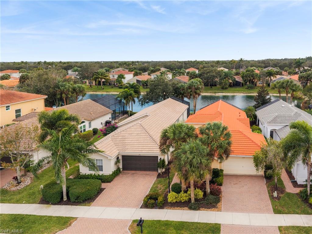 1770 Ribbon Fan Lane Naples, FL 34119 - Photo 7 of 37 an aerial view of multiple house