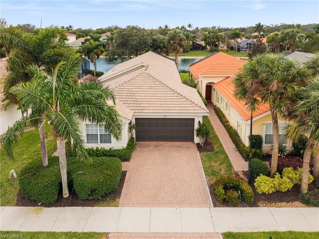1770 Ribbon Fan Lane Naples, FL 34119 - Photo 8 of 37 an aerial view of a house