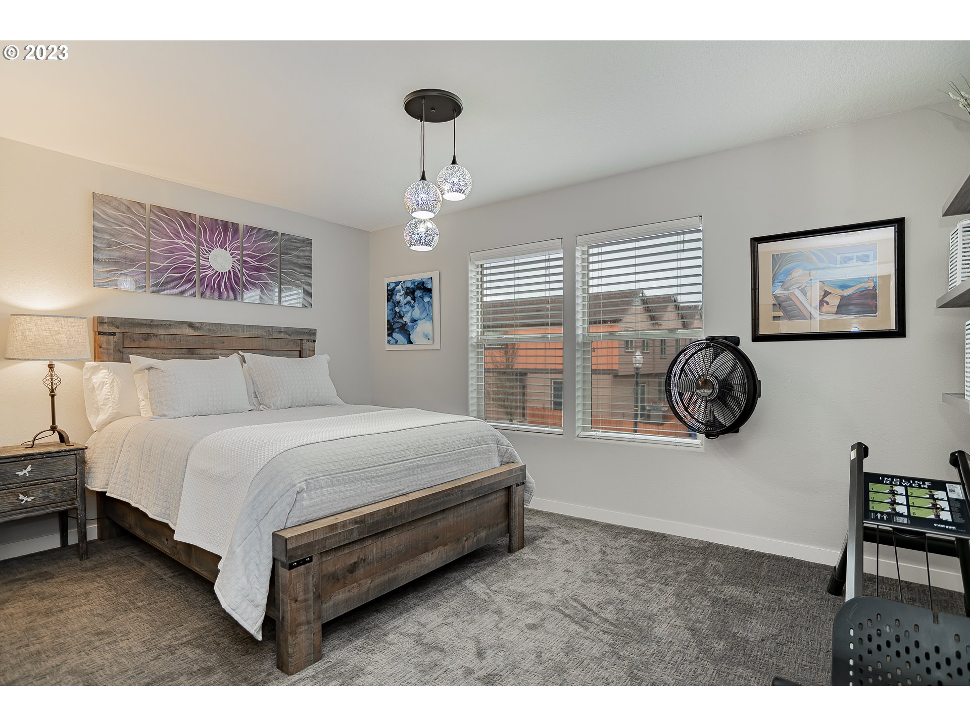 4020 North 1st Way Ridgefield, WA 98642 - Photo 15 of 32 a spacious bedroom with a bed and a table