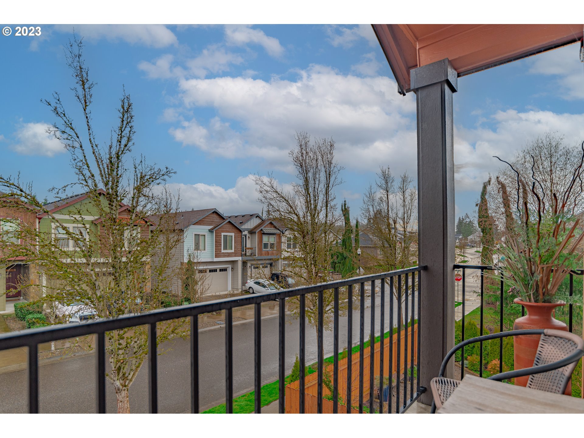 4020 North 1st Way Ridgefield, WA 98642 - Photo 19 of 32 a view of a balcony with a floor to ceiling window and wooden fence