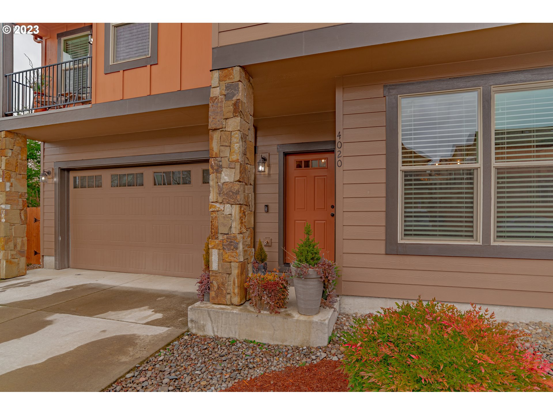 4020 North 1st Way Ridgefield, WA 98642 - Photo 2 of 32 a view of a house with a small garden