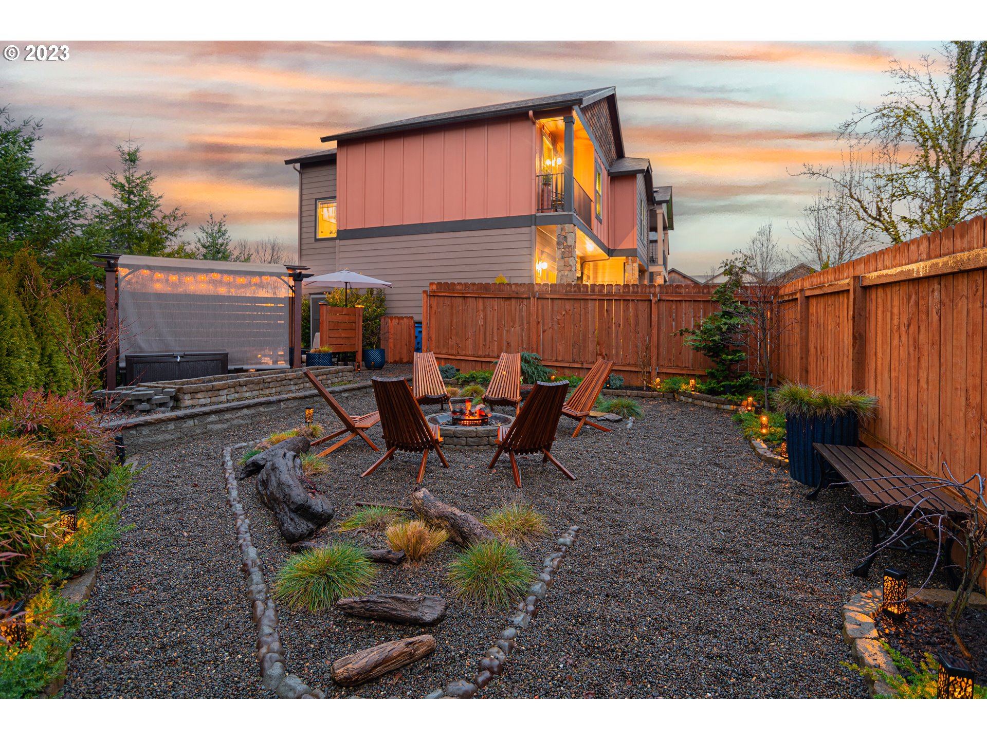 4020 North 1st Way Ridgefield, WA 98642 - Photo 28 of 32 a backyard of a house with table and chairs