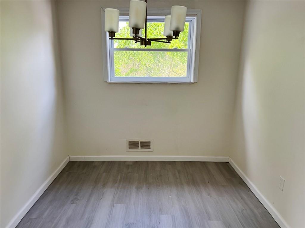 279 Olympic Road Pittsburgh, PA 15236 - Photo 7 of 25 an empty room with a window