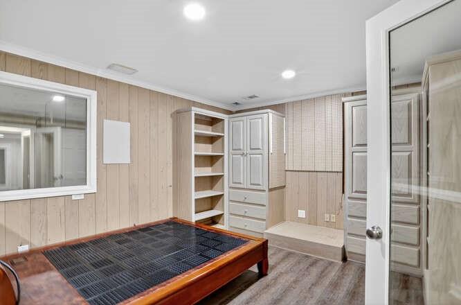 2551 East Maddox Road Buford, GA 30519 - Photo 32 of 50 a view of wooden floor and windows in a room