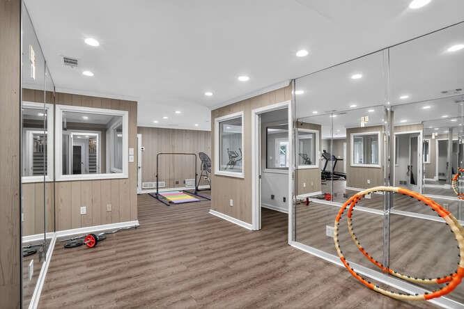 2551 East Maddox Road Buford, GA 30519 - Photo 34 of 50 a very nice looking room with a large window and furniture