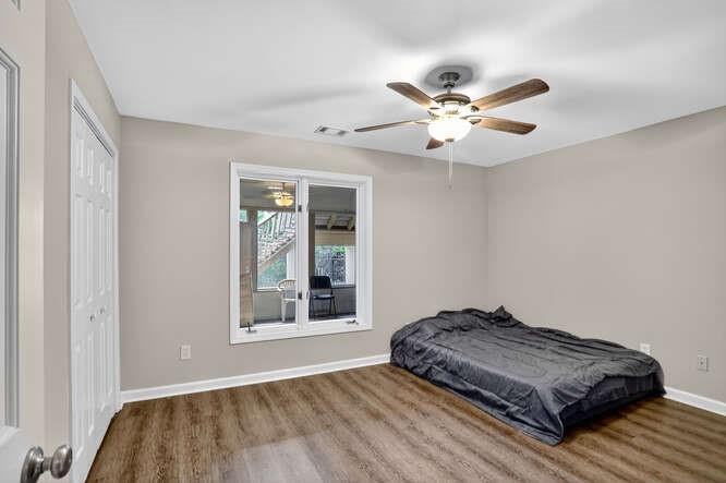 2551 East Maddox Road Buford, GA 30519 - Photo 36 of 50 a bedroom with bed and window