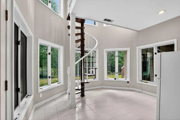 a view of an entryway with a staircase