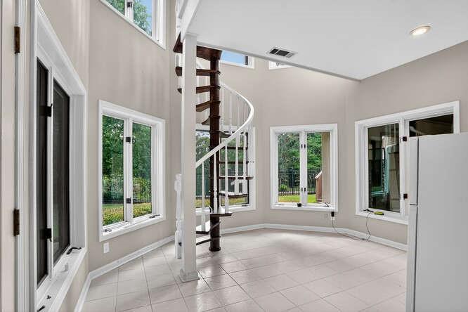 2551 East Maddox Road Buford, GA 30519 - Photo 42 of 50 a view of an entryway with a staircase