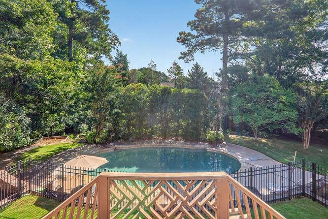 2551 East Maddox Road Buford, GA 30519 - Photo 46 of 50 a view of lake with a swimming pool