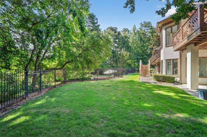 2551 East Maddox Road Buford, GA 30519 - Photo 47 of 50 a front view of a house with a yard