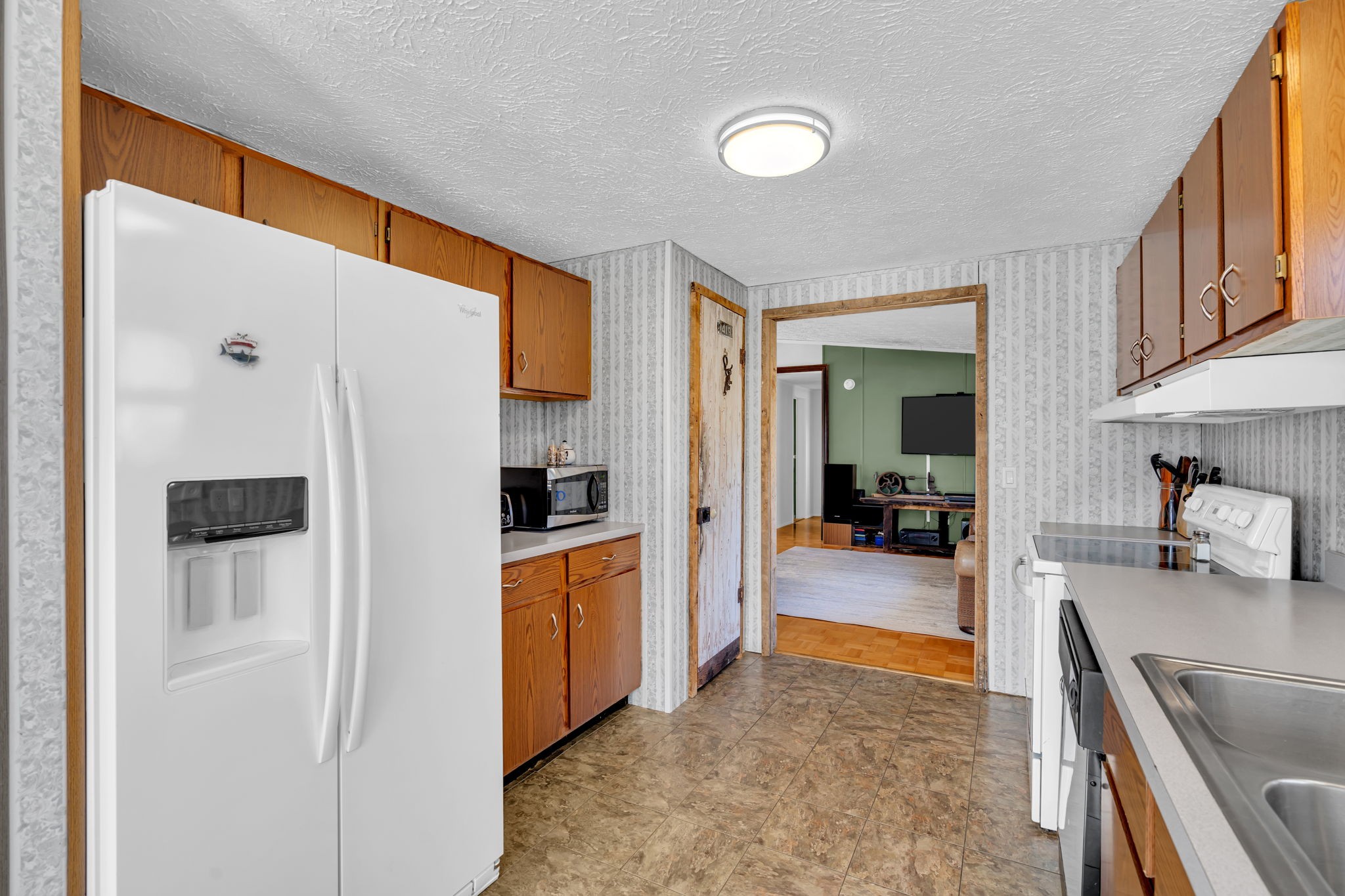 1039 Riverview Road Mount Juliet, TN 37122 - Photo 15 of 40 a kitchen with stainless steel appliances a refrigerator and a sink