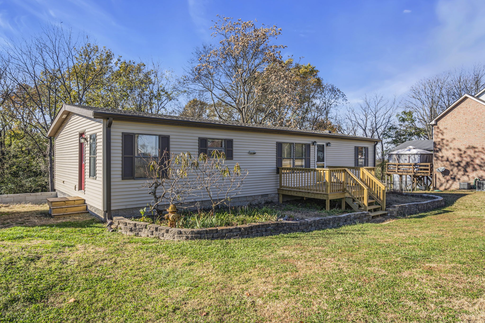 1039 Riverview Road Mount Juliet, TN 37122 - Photo 2 of 40 a view of a house with backyard and sitting area