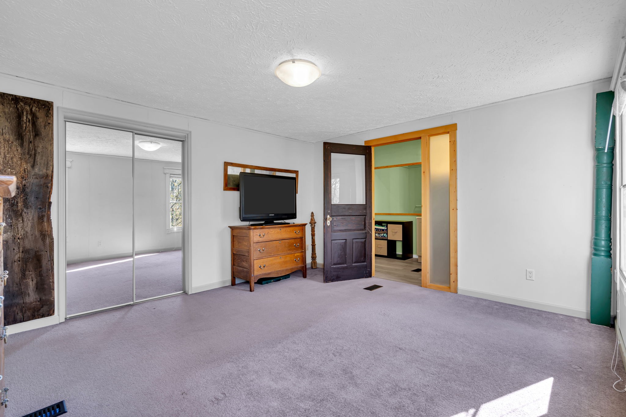 1039 Riverview Road Mount Juliet, TN 37122 - Photo 22 of 40 a room with furniture and a flat screen tv