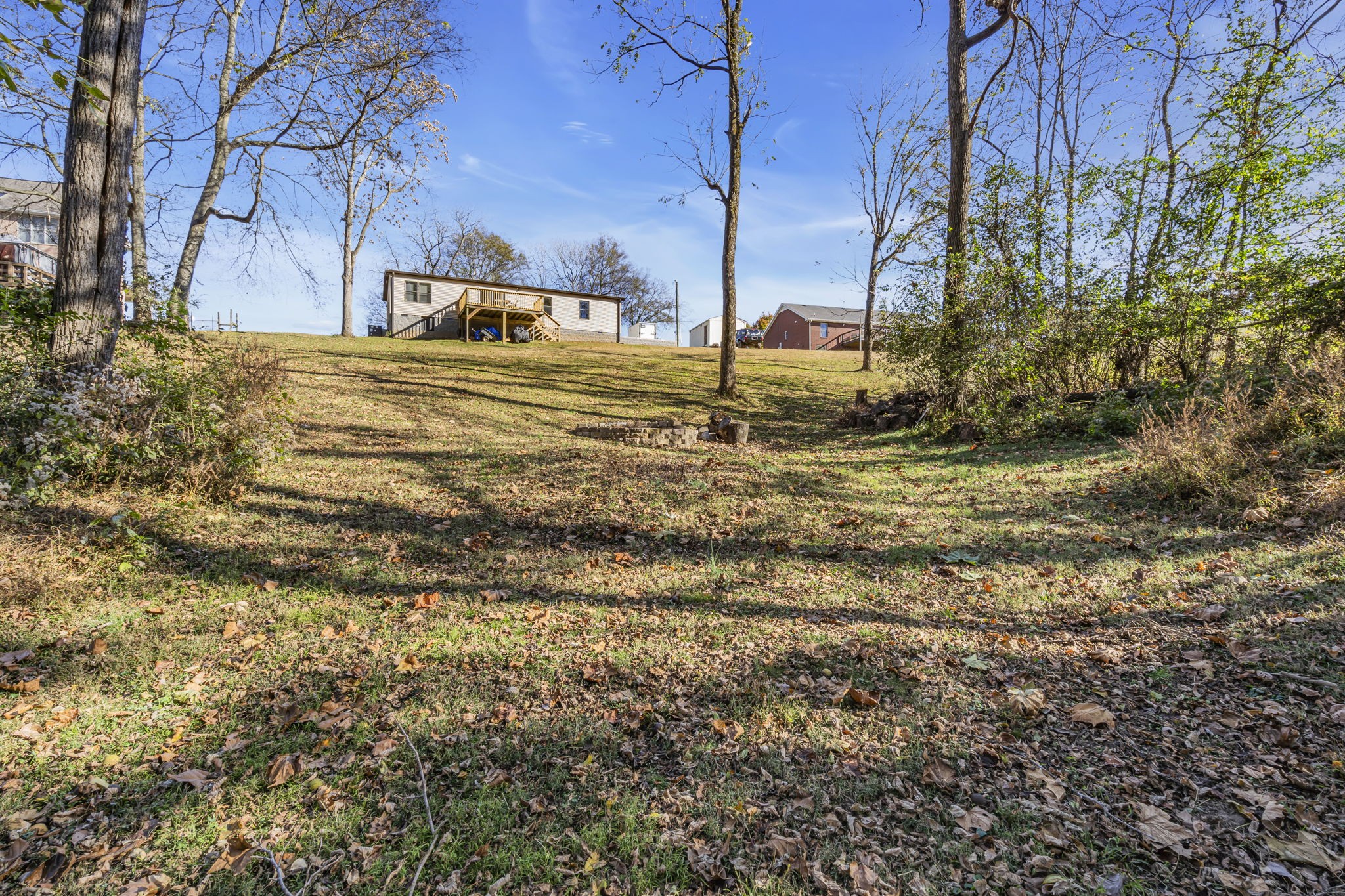 1039 Riverview Road Mount Juliet, TN 37122 - Photo 33 of 40 a view of a yard with an trees