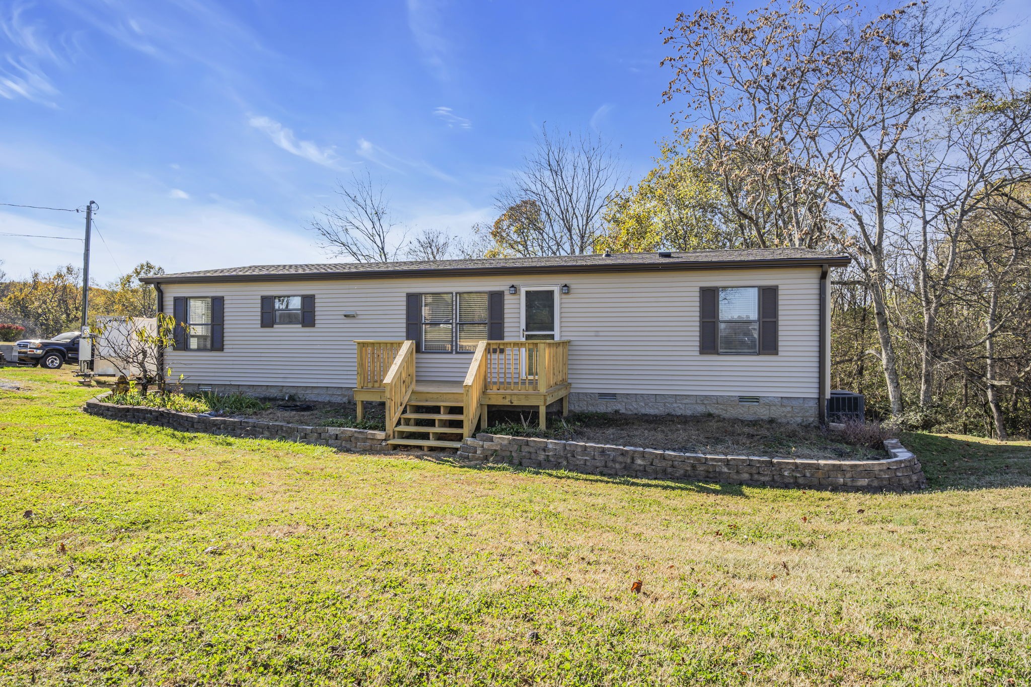1039 Riverview Road Mount Juliet, TN 37122 - Photo 5 of 40 a view of a house with pool and chairs