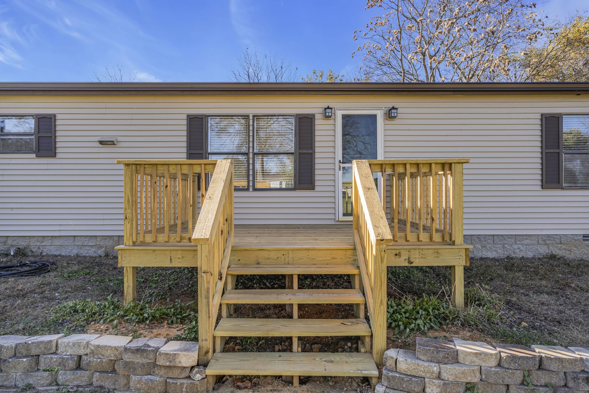 1039 Riverview Road Mount Juliet, TN 37122 - Photo 7 of 40 a view of a brick house with a large window