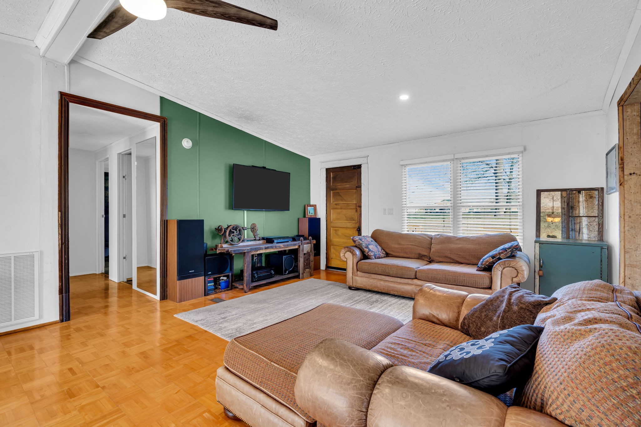 1039 Riverview Road Mount Juliet, TN 37122 - Photo 10 of 40 a living room with furniture and a flat screen tv