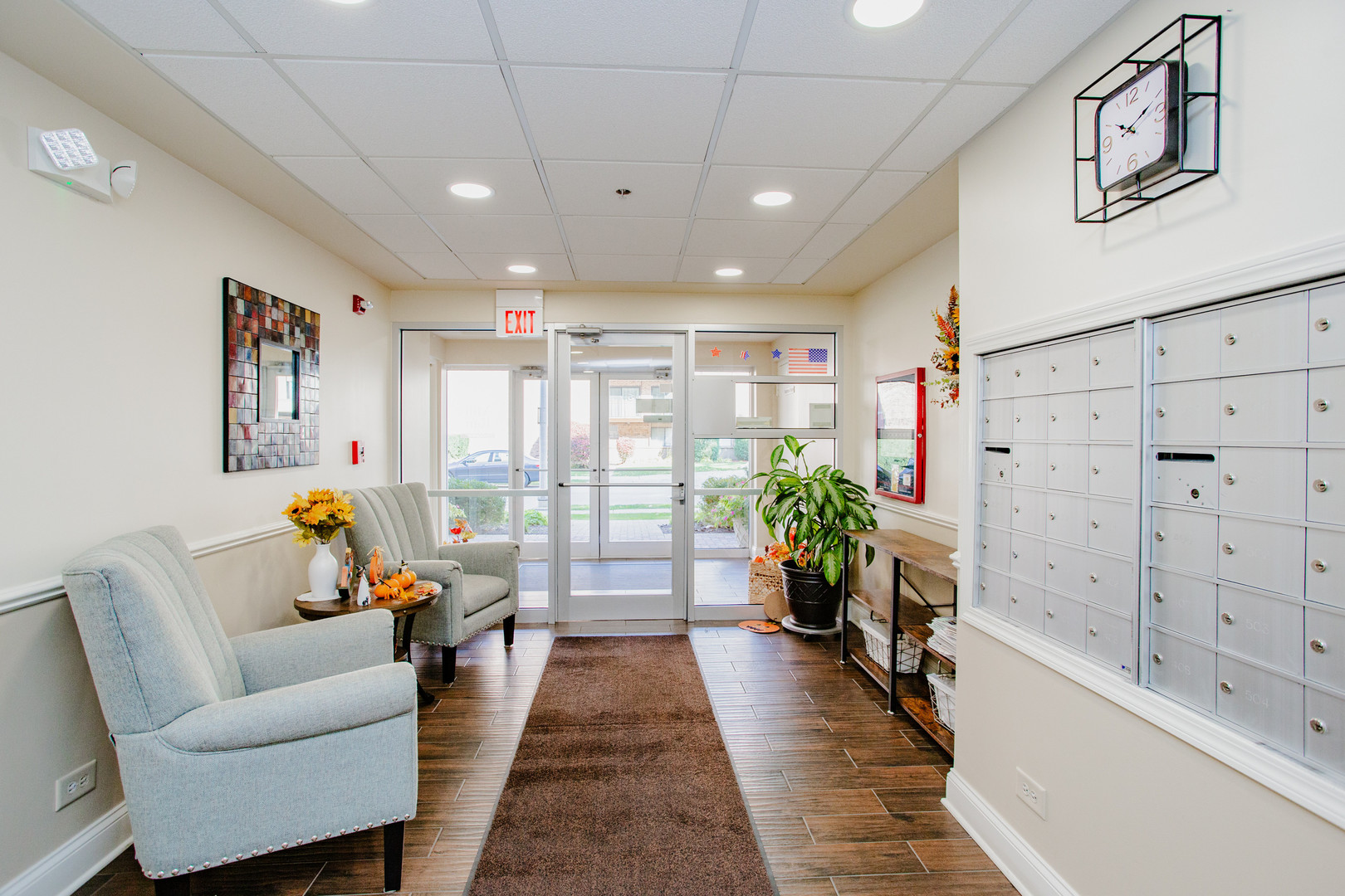 1685 Mill Street, Unit 605 Des Plaines, IL 60016 - Photo 3 of 25 a living room with furniture and a large window