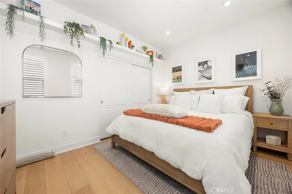 a bedroom with bed and window