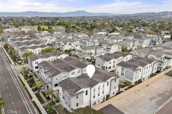 a view of city with ocean